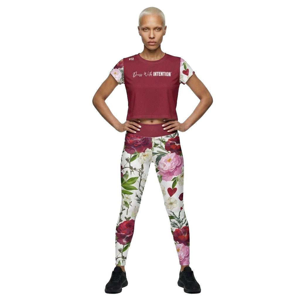 Model Wearing Jesus Loves You Crop Top with Dress With Intention on Front in Red with matching workout leggings and floral design, front view