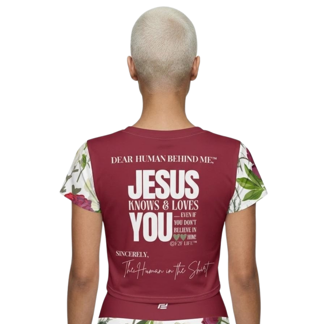 Model wearing Dear Human Behind Me Msg 12, Jesus Loves You Crop top in red with floral design, back view