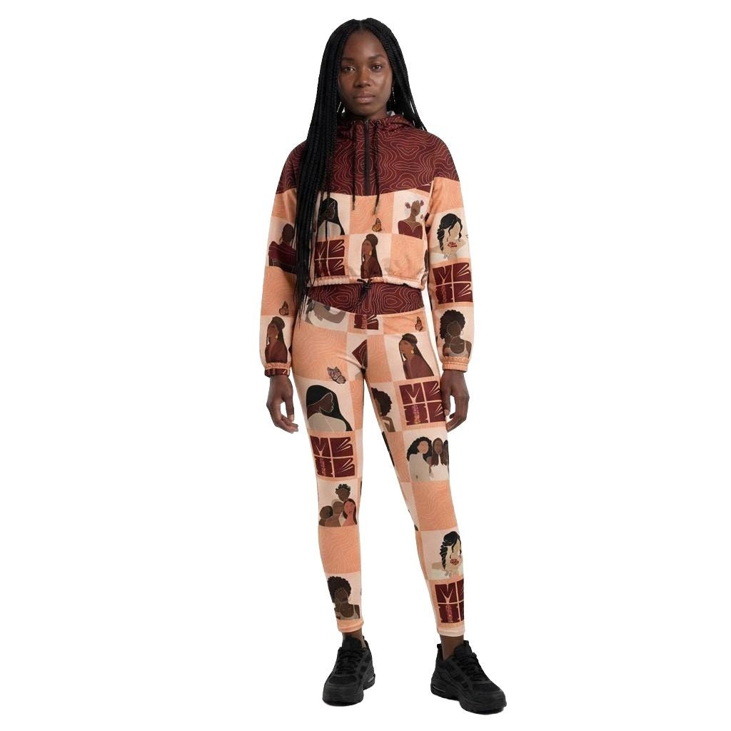 Model wearing My Black is Beautiful Cropped Windbreaker in Red with matching workout leggings. Diverse black woman pattern in red and creme