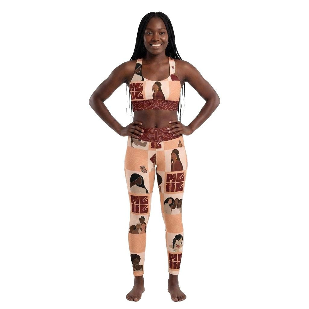 Model wearing roses of My Black is Beautiful activewear set consisting of a sports bra and leggings, with diverse black women pattern in red and creme