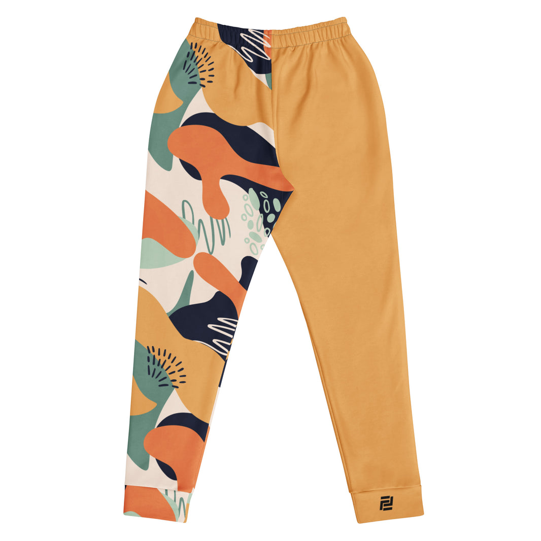 "Fierce & Fluid" joggers with abstract pattern and gold colorblock, women’s bold activewear back view