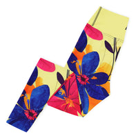 Bright & Blooming floral yoga leggings with vibrant colors, eco-friendly women’s activewear left folded viewn