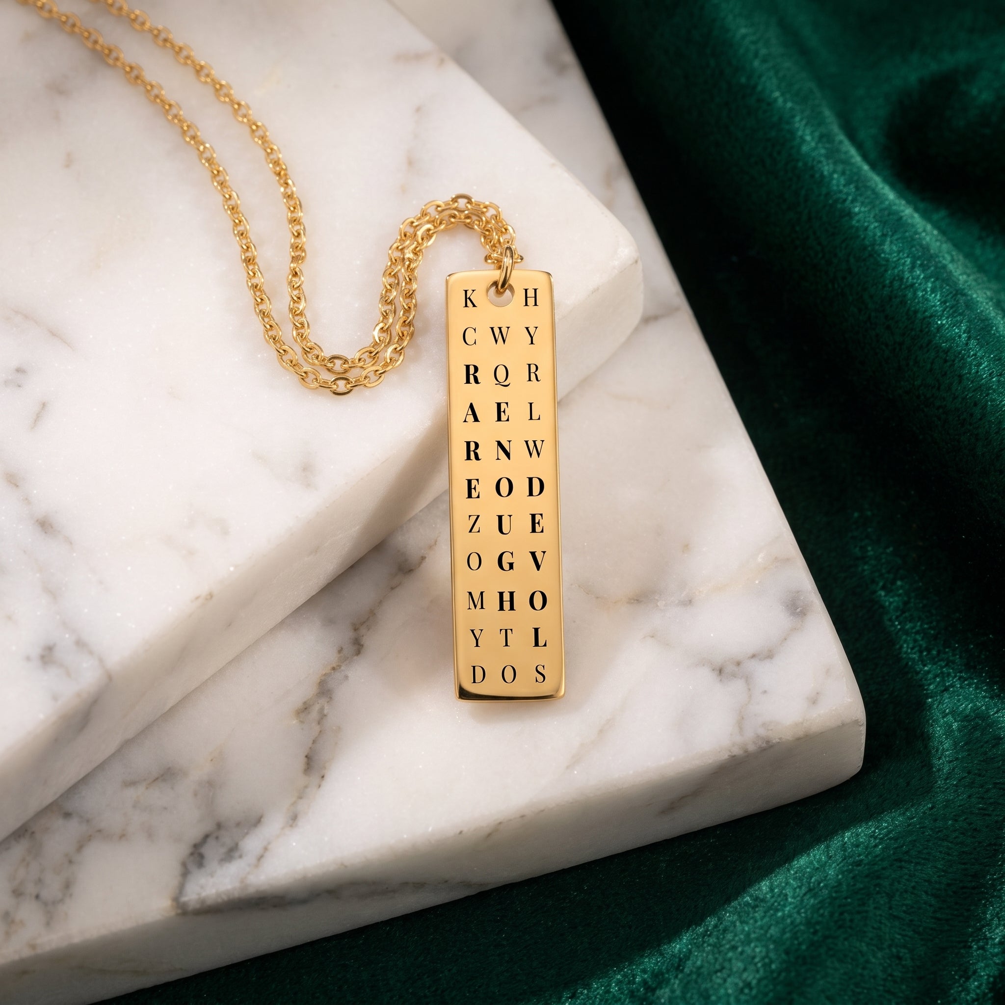 Rare enough loved gold plated fine chain necklace on marble surface 