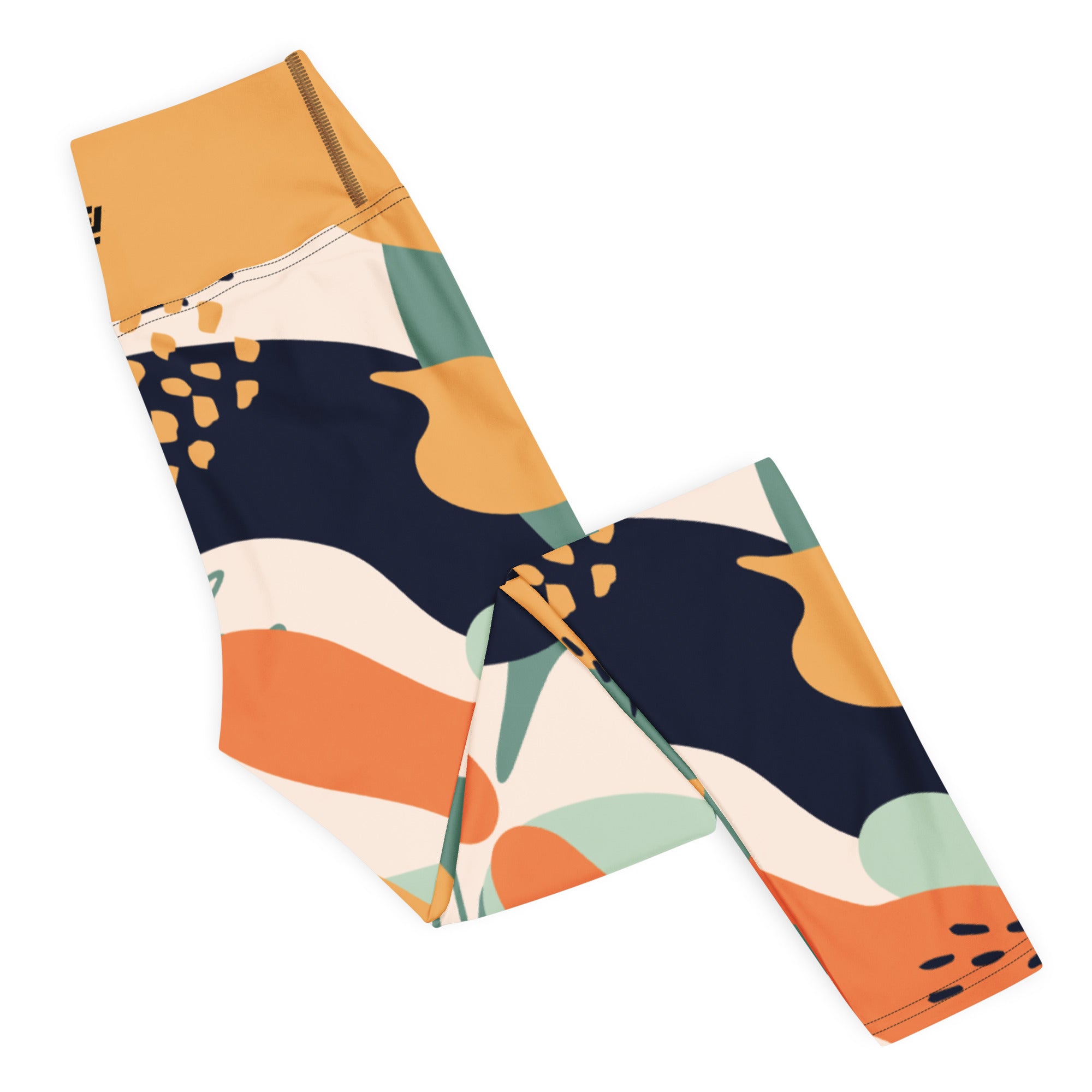 Fierce & fluid abstract yoga leggings with vibrant colors, eco-friendly women’s activewear right folded viewn