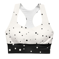 "God Approved" longline sports bra with polka dot and black band, medium-high support activewear front view