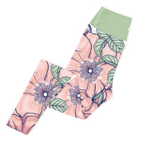 Love in bloom floral yoga leggings with soft colors, eco-friendly women’s activewear left folded view
