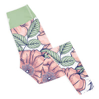 Love in bloom floral yoga leggings with soft colors, eco-friendly women’s activewear right folded view