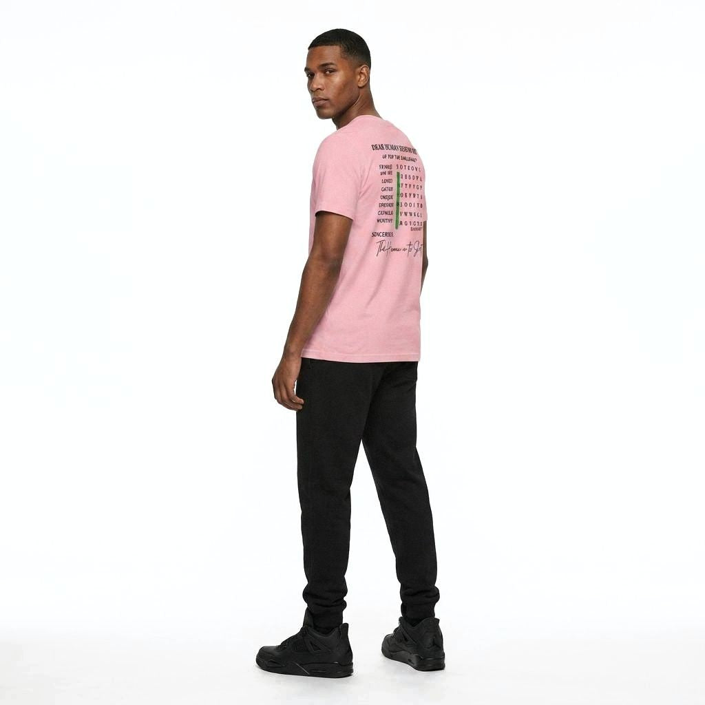 Model looking to side, viewed from behind wearing Dear Human Behind Me, Message #10 Things You Are T-shirt in Pink.