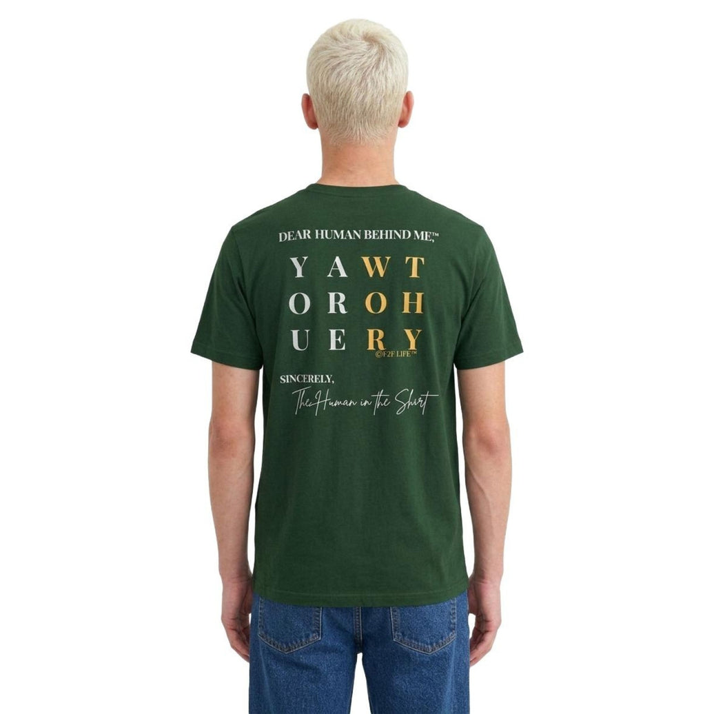 Model viewed from behind wearing Dear Human Behind Me, Message #11 You Are Worthy T-shirt in green.