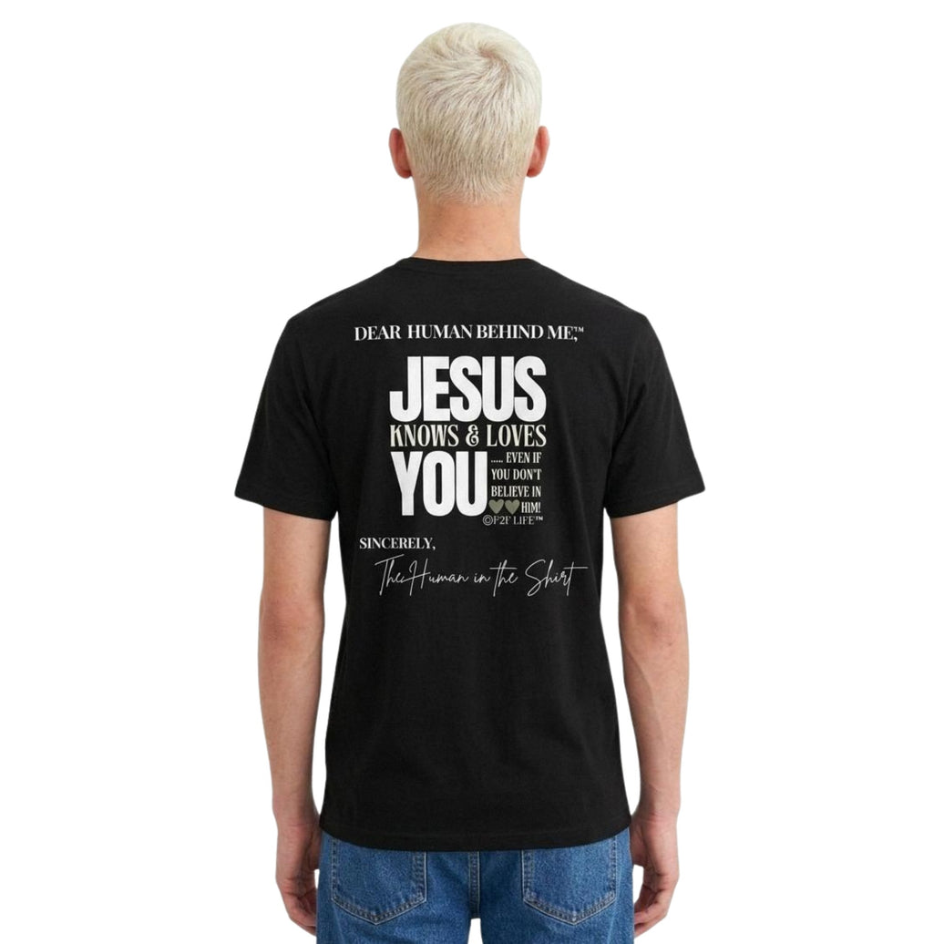 Model viewed from behind wearing Dear Human Behind Me, Message #12 Jesus Loves You T-shirt in black.
