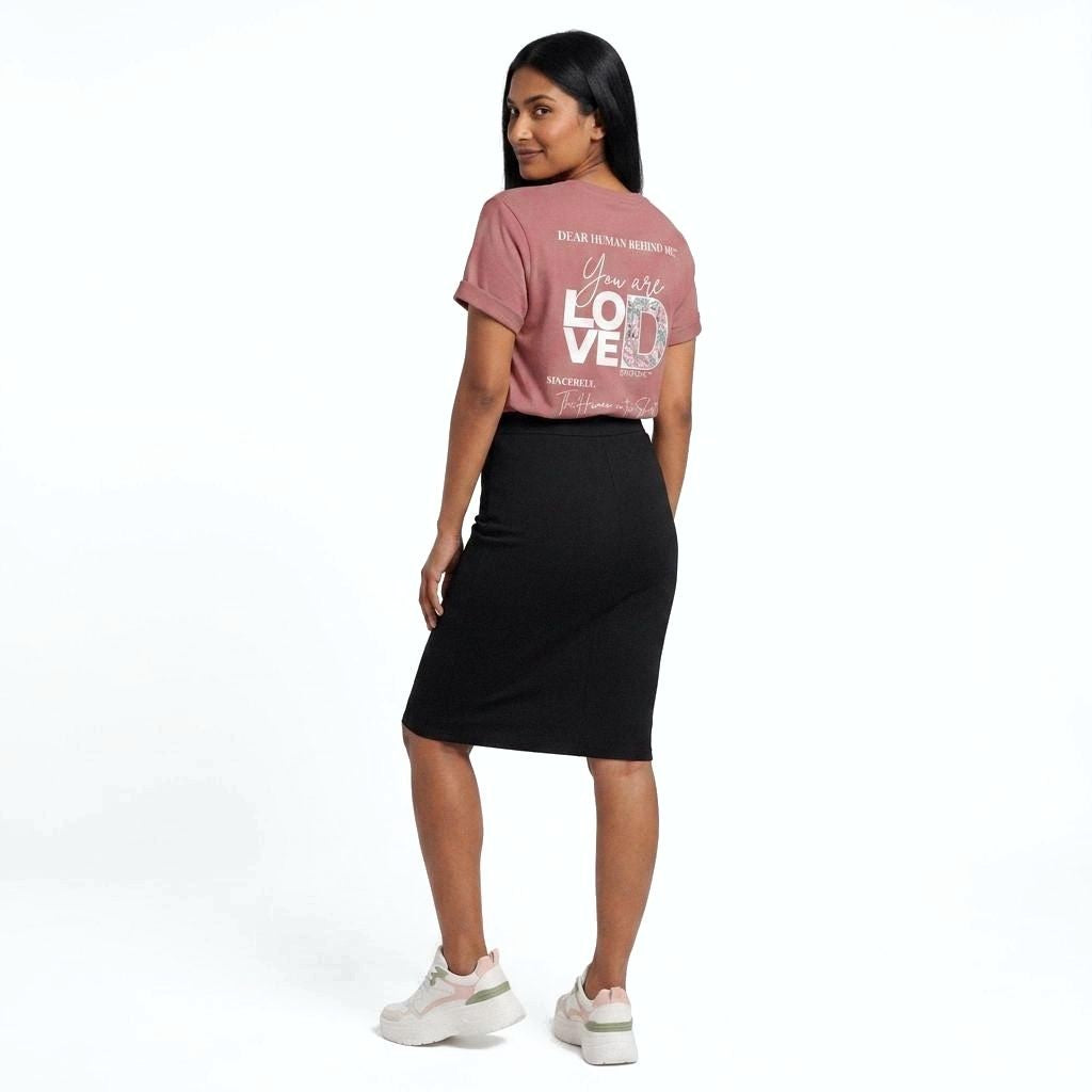 Model viewed from side wearing Dear Human Behind Me, Message #1 You Are Loved T-shirt in mauve.