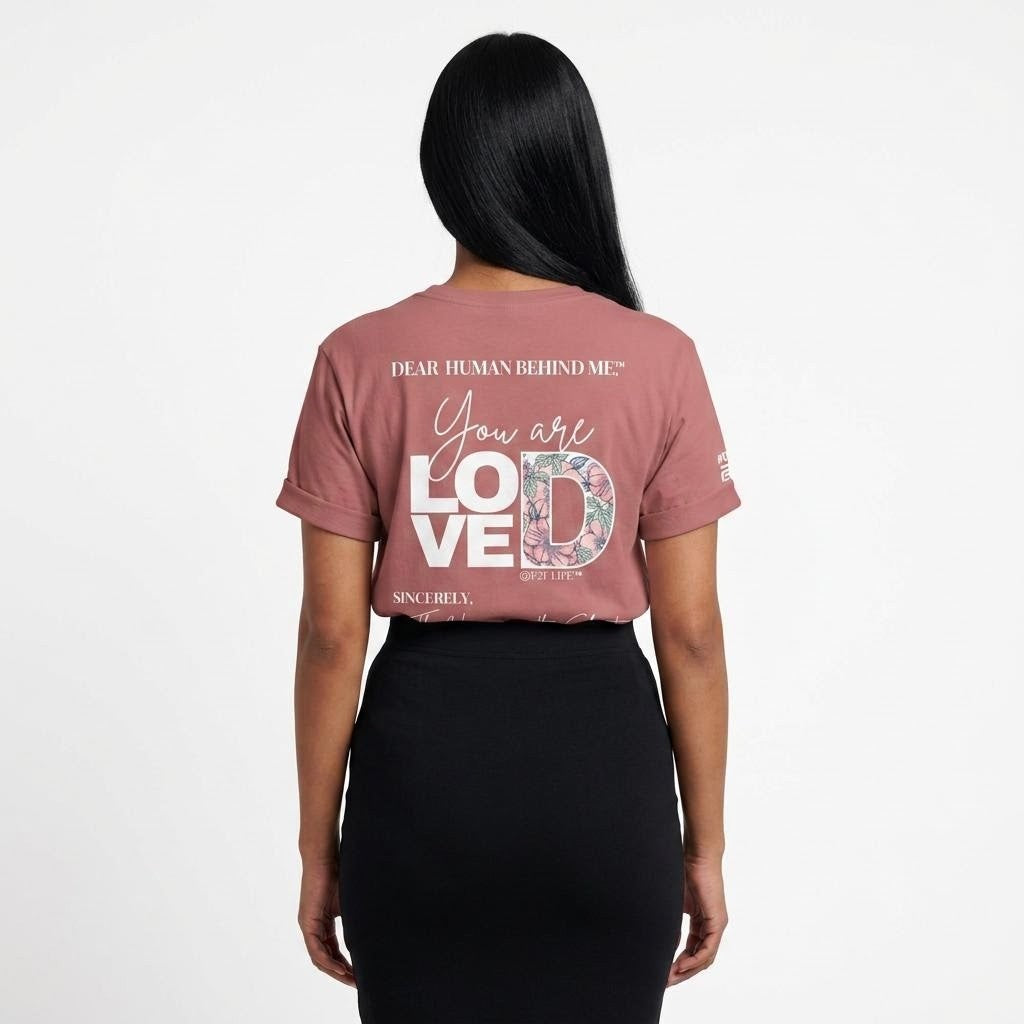Model viewed from behind wearing Dear Human Behind Me, Message #1 You Are Loved T-shirt in mauve.