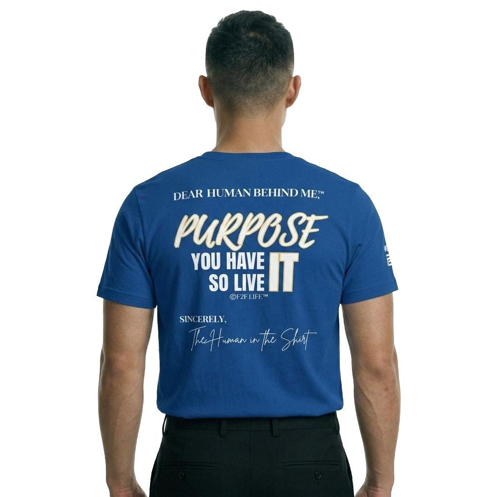 Model viewed from behind wearing Dear Human Behind Me, Message #7 You have Purpose T-shirt in blue.