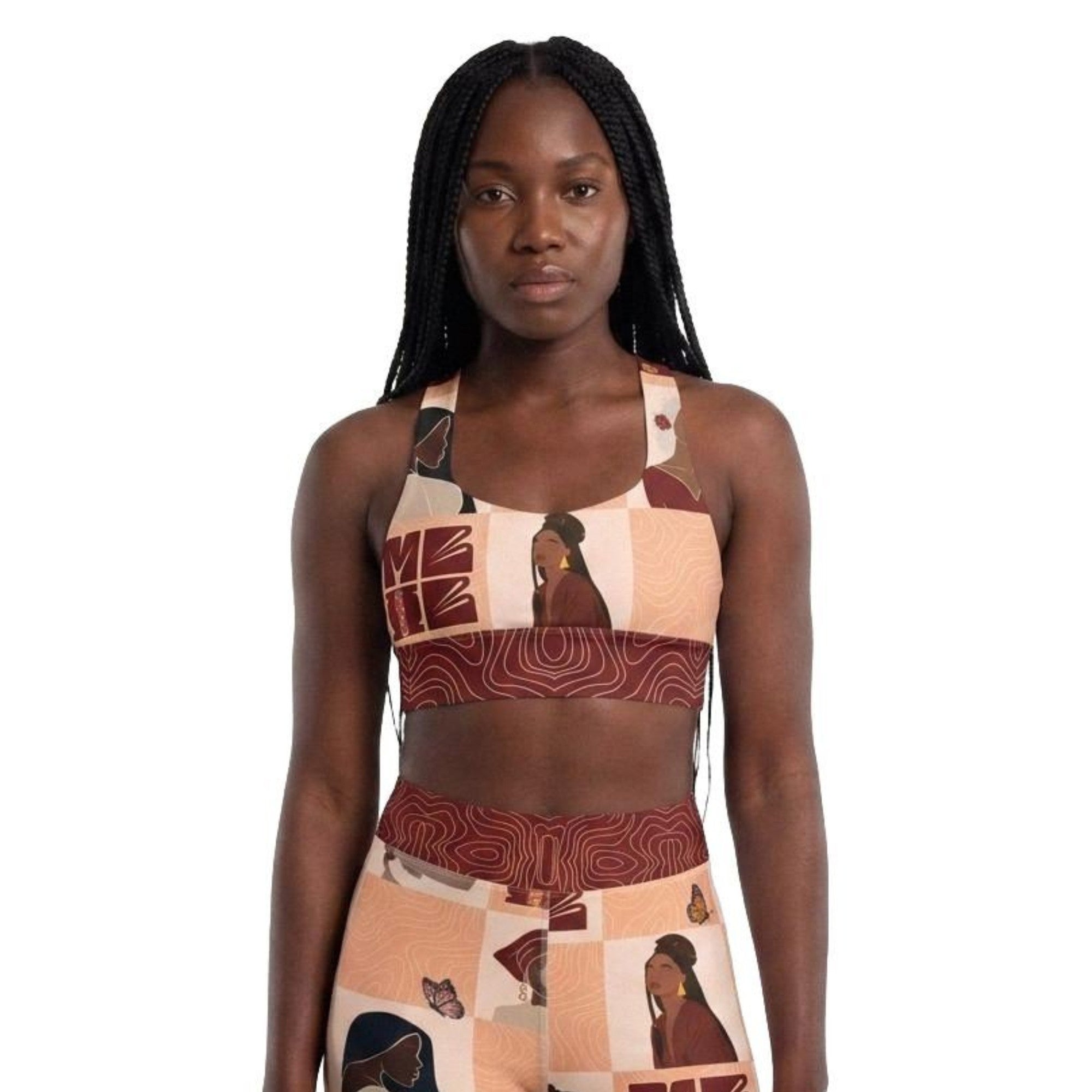 Model wearing My Black Is Beautiful longline sports bra front view with black woman design and red accents