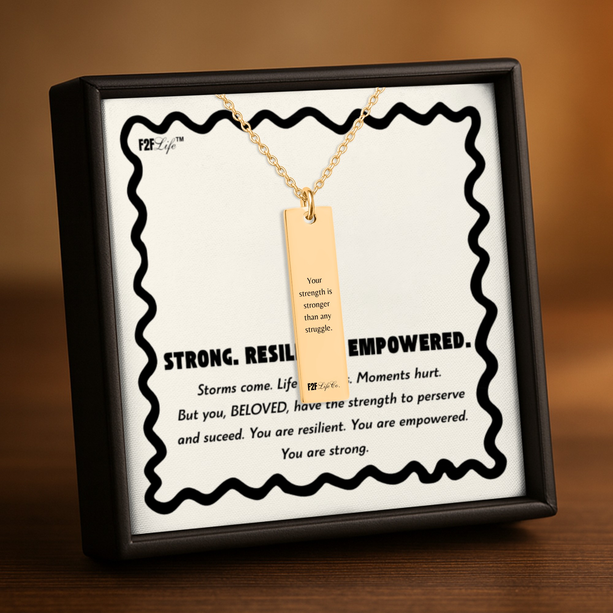 Resilient vertical bar necklace with fine chain back view with message in a jewelry box with insert
