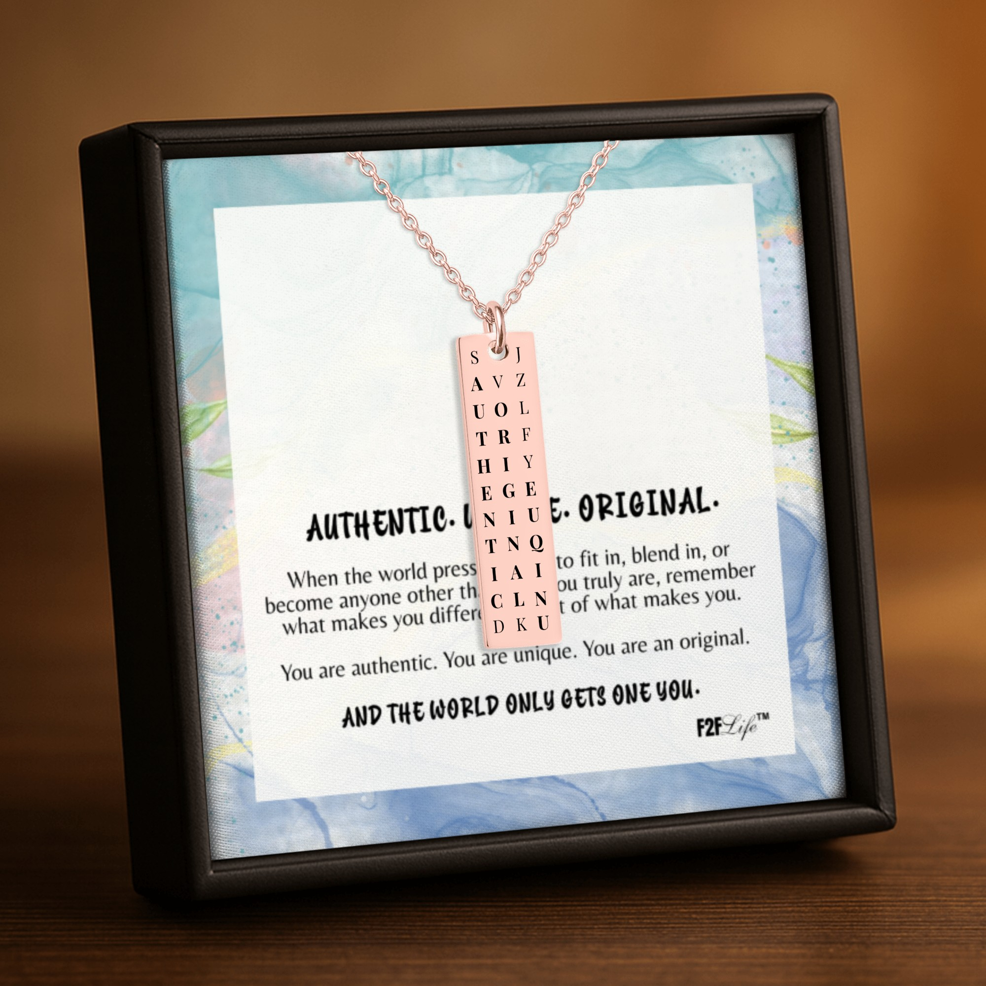 Rose gold plated authentic unique original vertical bar word search necklace with a fine link chain in a box with a jewelry insert