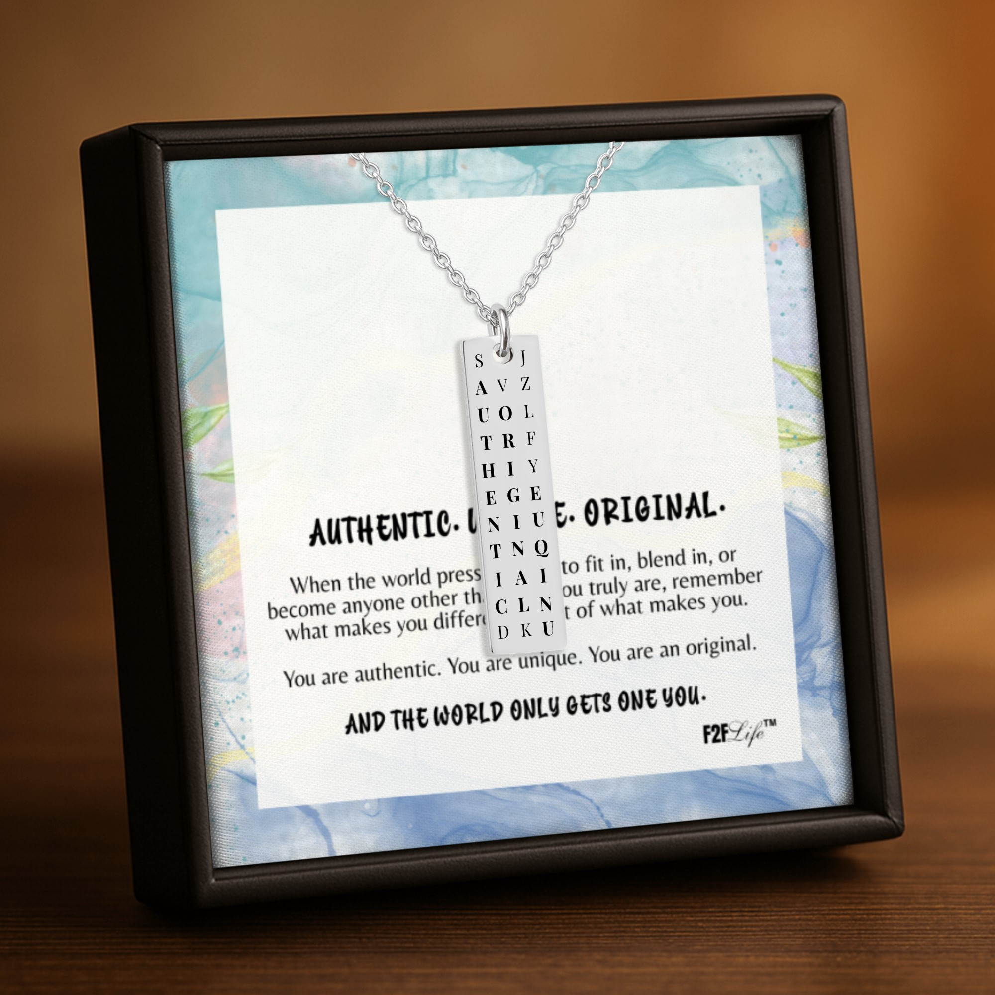 Stainless steel authentic original unique vertical bar word search necklace with a fine link chain in a box with a jewelry insert