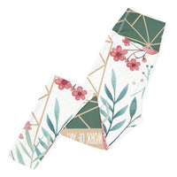 Work of art floral geometric leggings with soft colors, eco-friendly women’s activewear left folded view