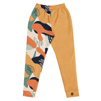 "Fierce & Fluid" joggers with abstract pattern and gold colorblock, women’s bold activewear back view