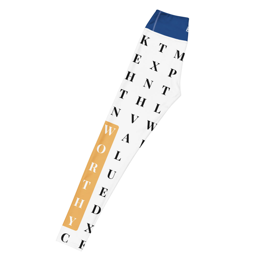 Left long view of "The Gold Standard" statement workout leggings with word search, eco-friendly women’s activewear 