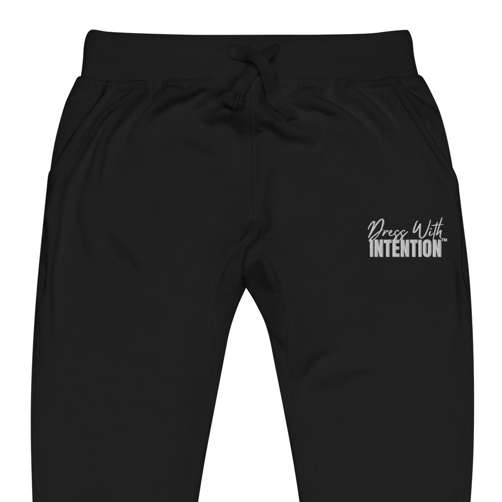 Zoomed in front view of "Dress With Intention" unisex joggers in black