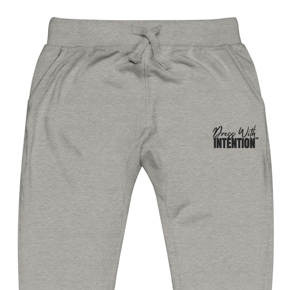 Zoomed in front view of "Dress With Intention" unisex joggers in carbon grey