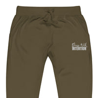 Zoomed in front view of "Dress With Intention" unisex joggers in military green