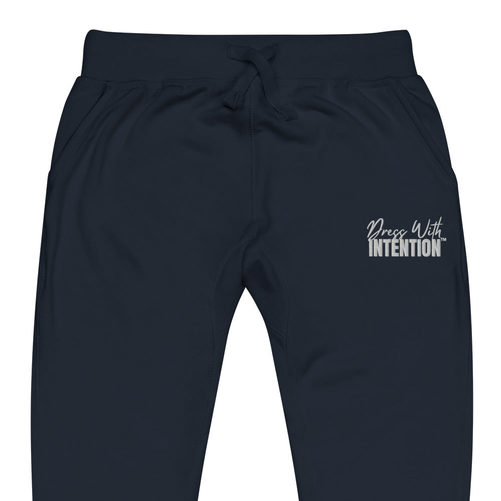 Zoomed in front view of "Dress With Intention" unisex joggers in navy