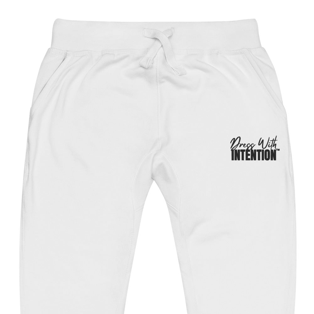 Zoomed in front view of "Dress With Intention" unisex joggers in white